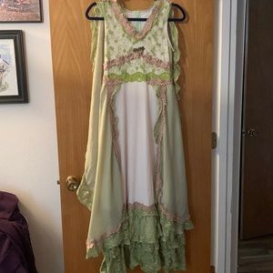 Unique beautiful gown. Great condition. Caped. Lace and stunning accents.